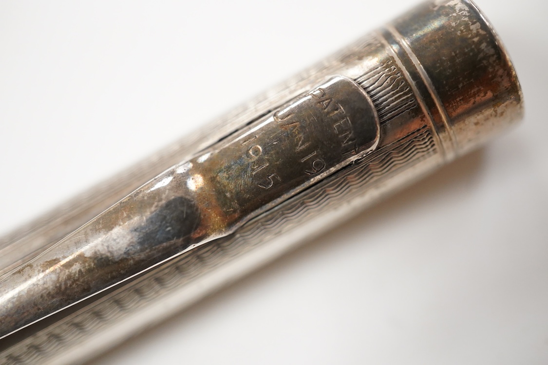 A Mabie Todd & Co. Swan Sterling silver lever filler, Made in USA with 14ct. flexible nib